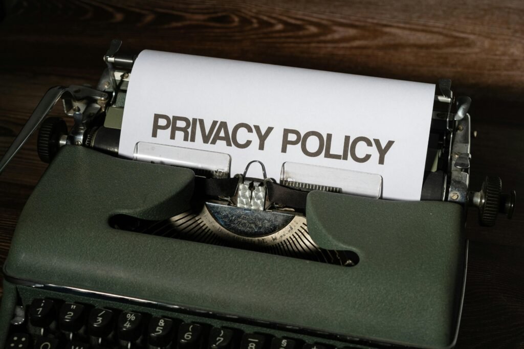 White Paper Inserted on a Vintage Typewriter Phintelligence LLC Privacy Policy